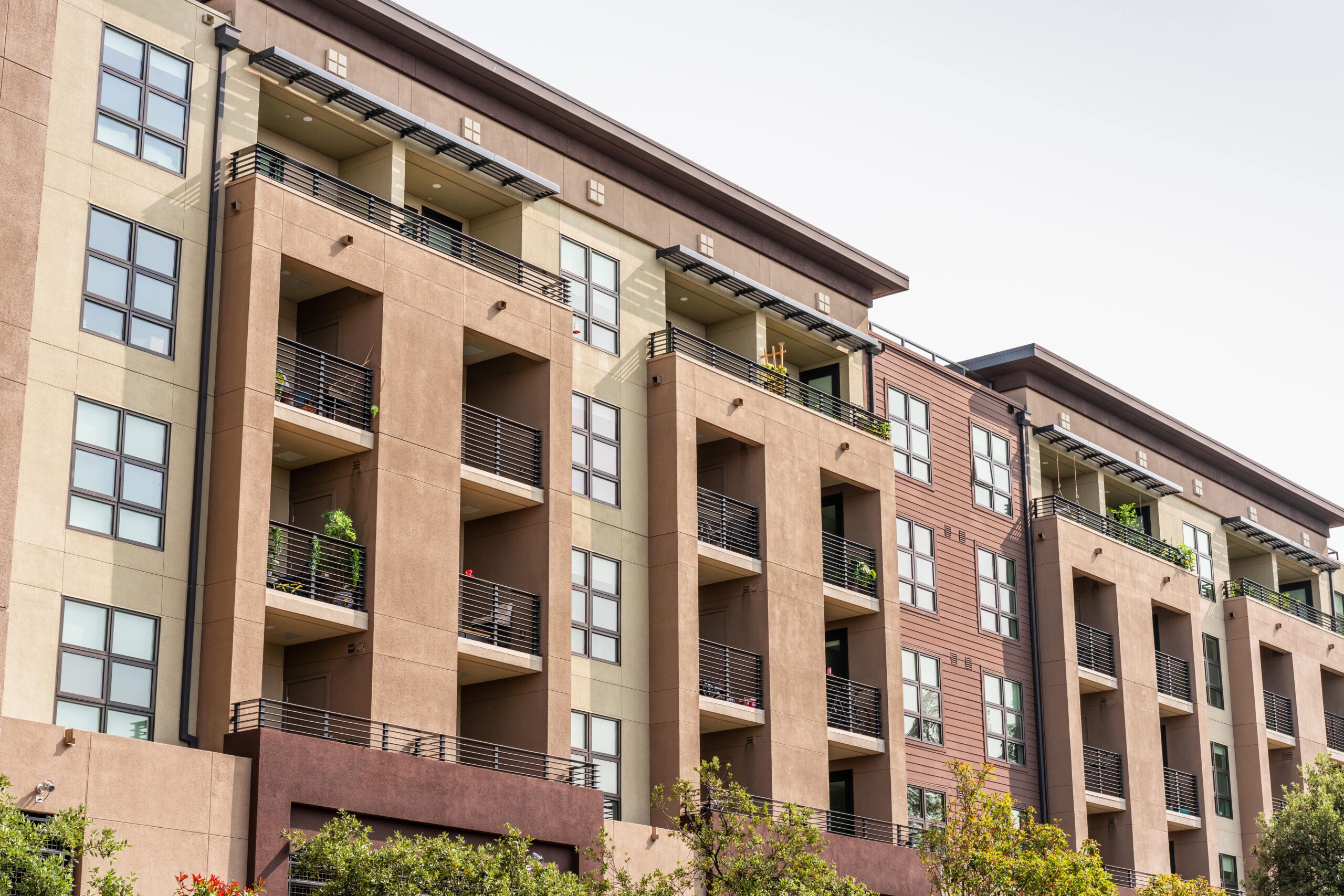 exterior-view-of-modern-apartment-building-2024-11-25-12-06-40-utc-min